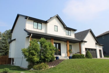 Exterior of House with Vertical and Horizonal White James Hardie Siding